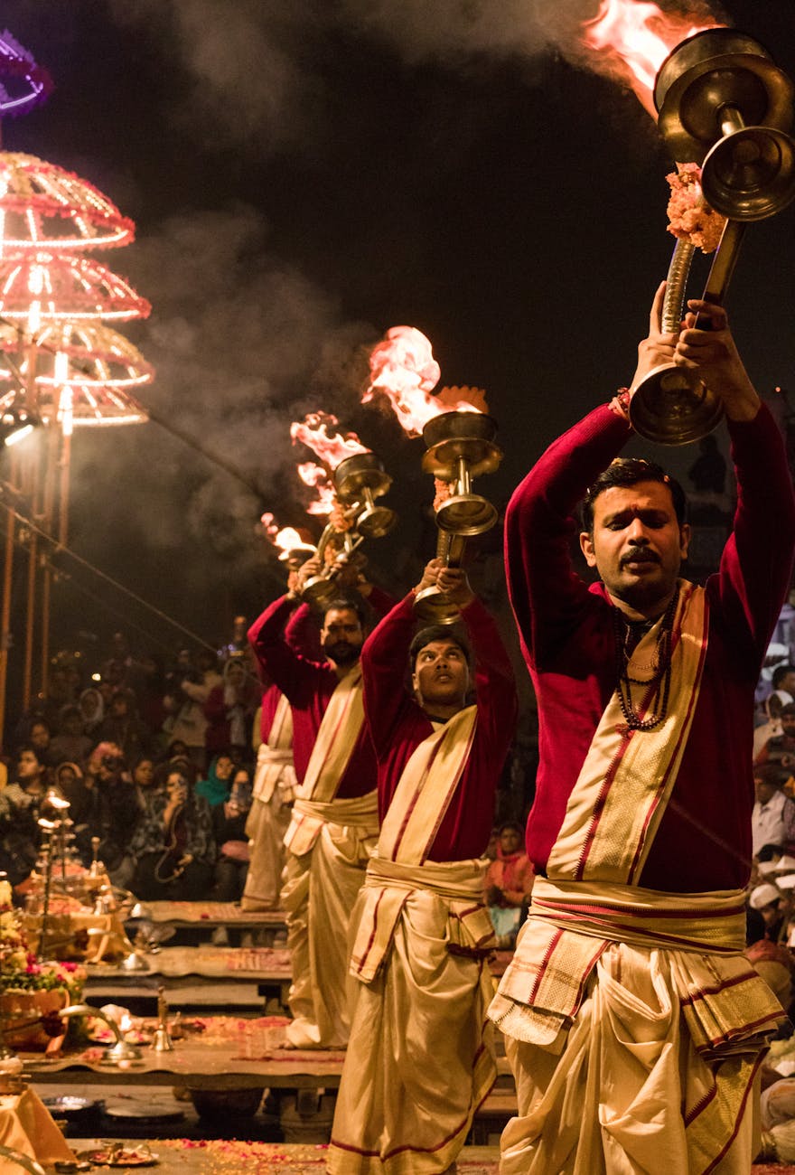 people in red traditional clothes