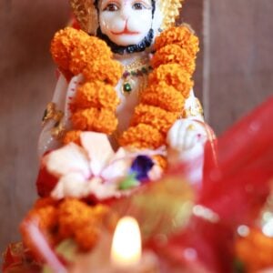 orange garland on a hindu god statue